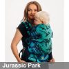 Woman carries toddler on her front in Lenny Lamb Preschool carrier in Jurassic Park fabric