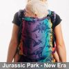 Woman carries toddler on her back in Lenny Lamb Preschool carrier in Jurassic Park New Era fabric