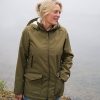 Woman wearing the Mamalila Cosy Allrounder babywearing coat in Khaki